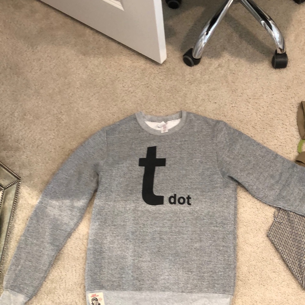 Light grey crewneck fits true to size